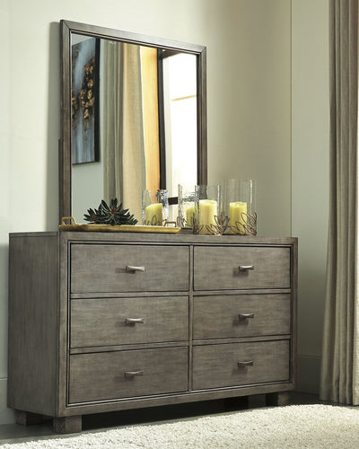 Arnett Signature Design by Ashley Dresser and Mirror image